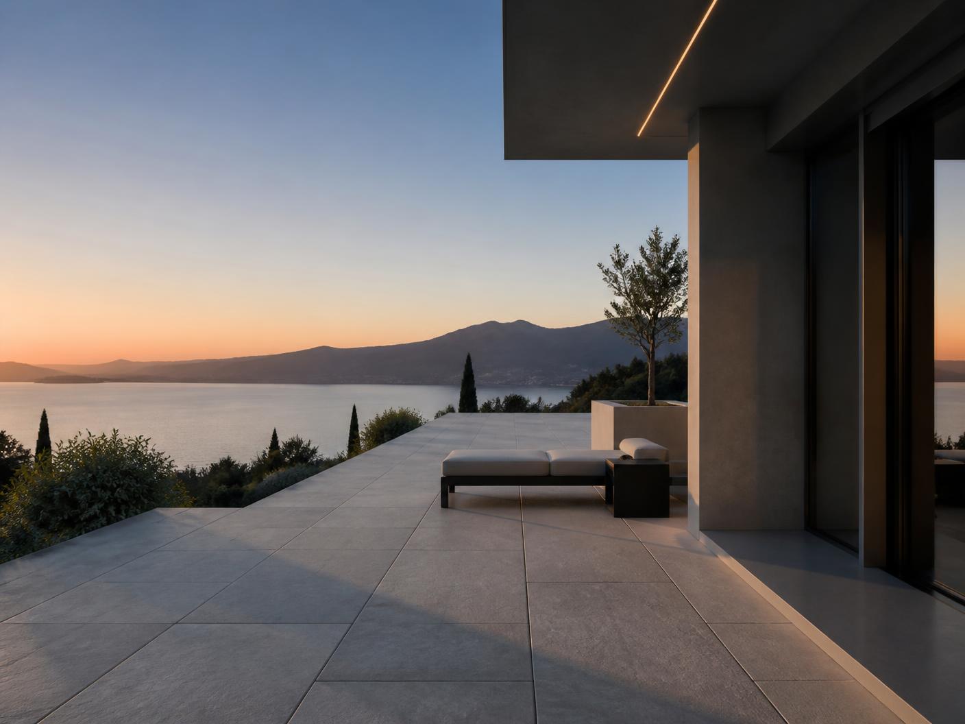 Terrasse en dalles de grès cérame posées sur plots avec vue sur le lac Léman